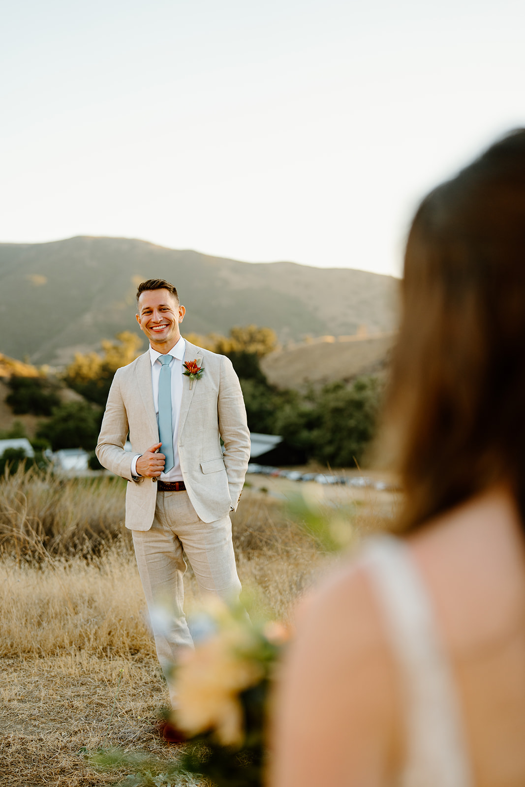 groom looking at bride at Higuera Ranch, San Luis Obispo CA, photography by Cobblestone
