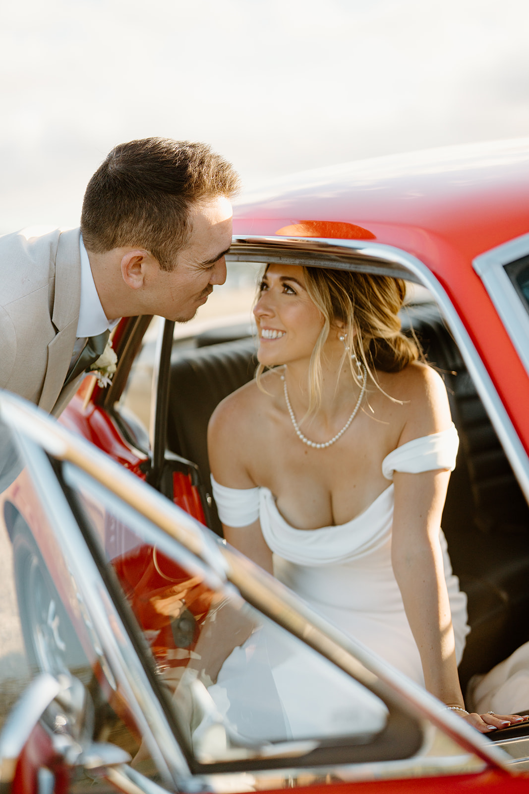 Bride and Groom in Red Mustang wedding photography in Lompoc California