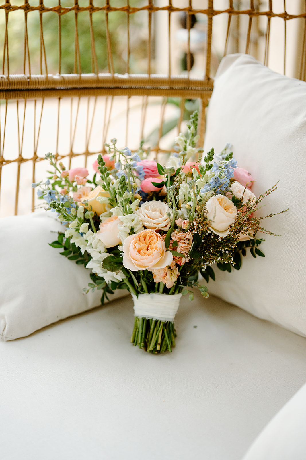 wedding florals on a chair in San Luis Obispo CA, photography by Cobblestone