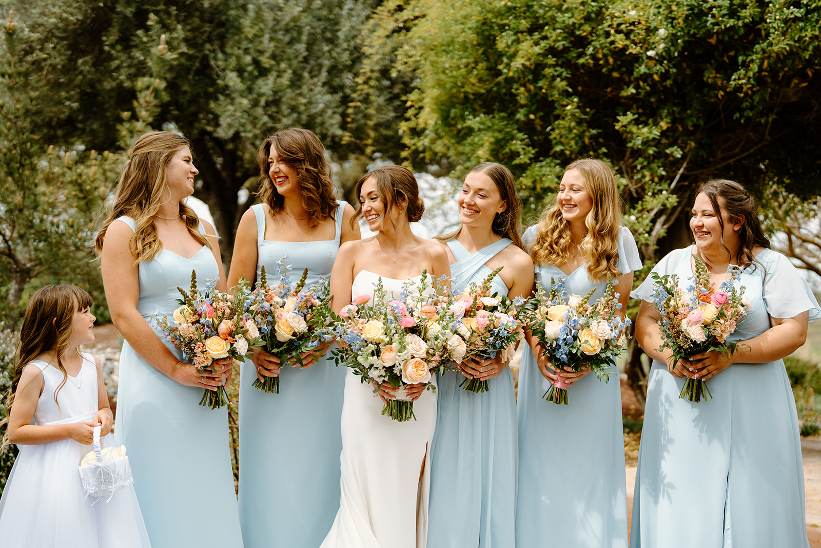 Bridesmaids with bride and flower girl in San Luis Obispo CA, photography by Cobblestone