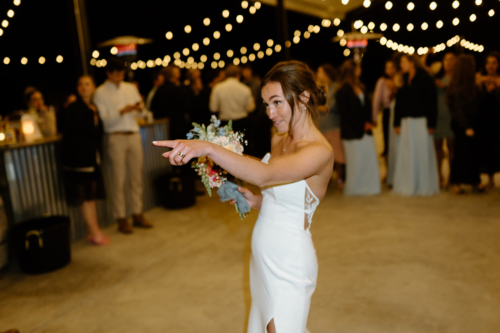 bride throws bouquet in San Luis Obispo CA, photography by Cobblestone