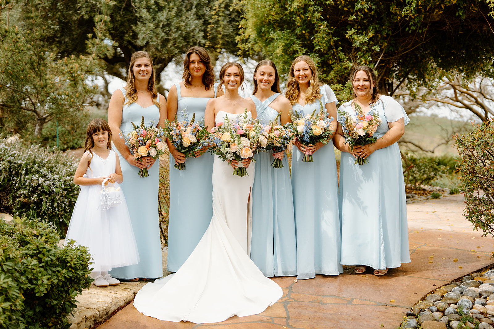 Bridesmaids with bride and flower girl in San Luis Obispo CA, photography by Cobblestone