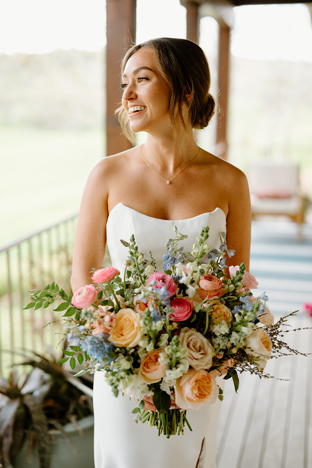 Bride with florals and wedding dress San Luis Obispo CA, photography by Cobblestone
