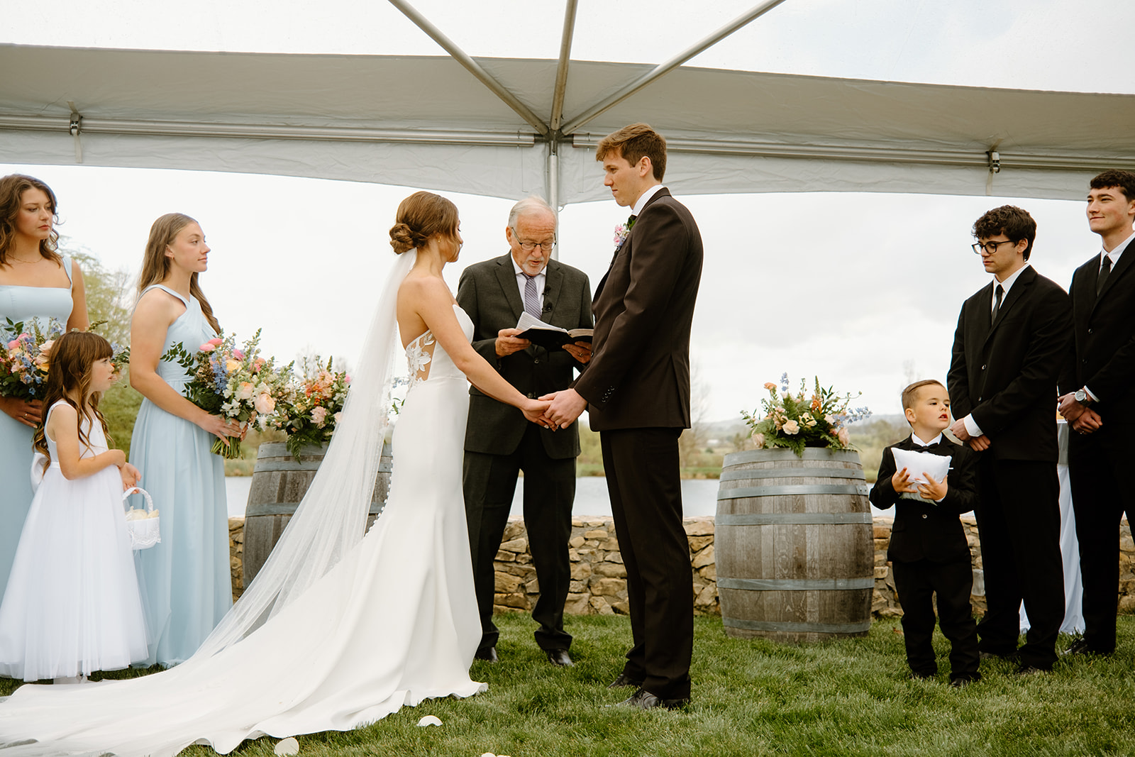 Bride and groom walk down isle at wedding in San Luis Obispo CA, photography by Cobblestone