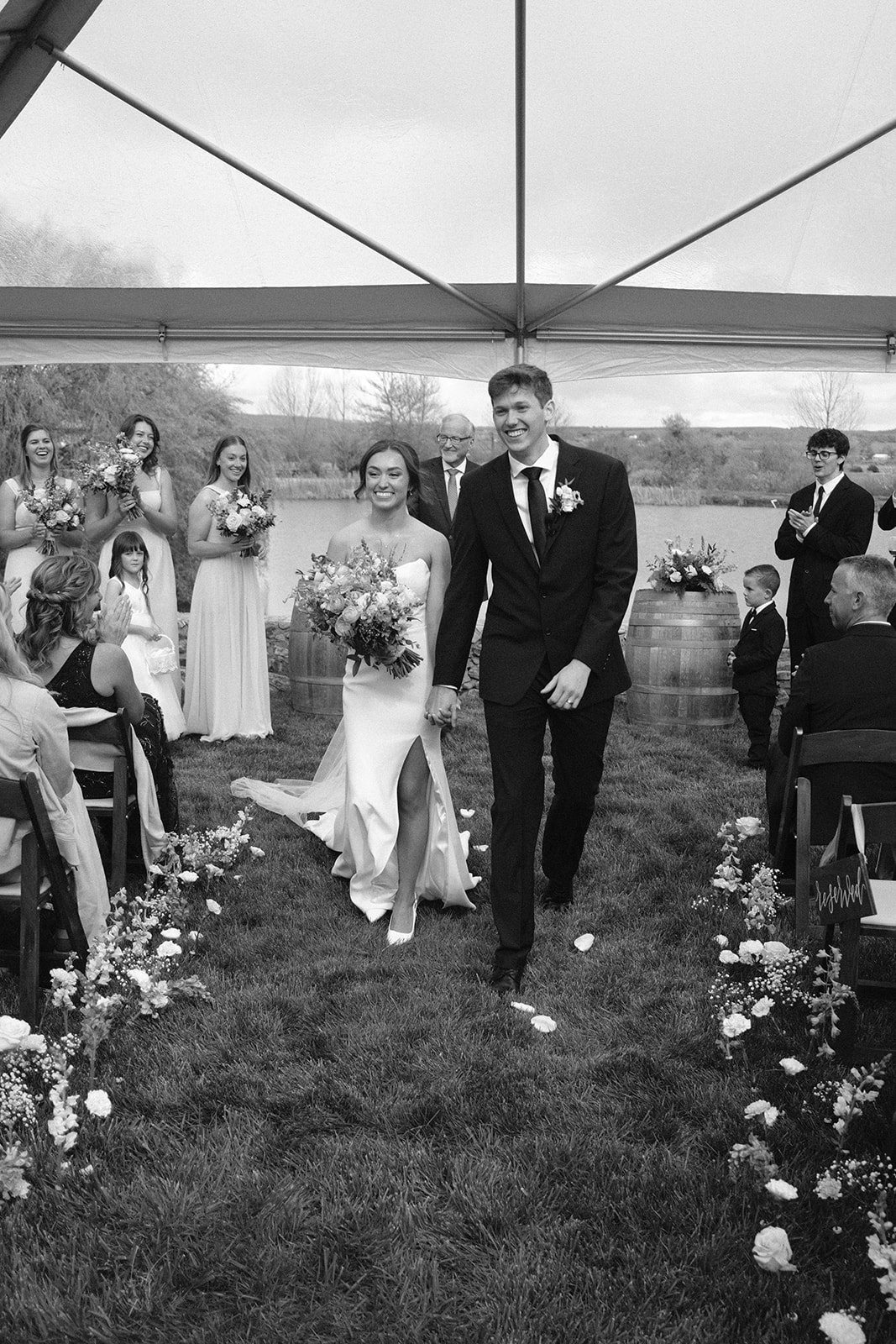 Bride and groom walk down isle at wedding in San Luis Obispo CA, photography by Cobblestone