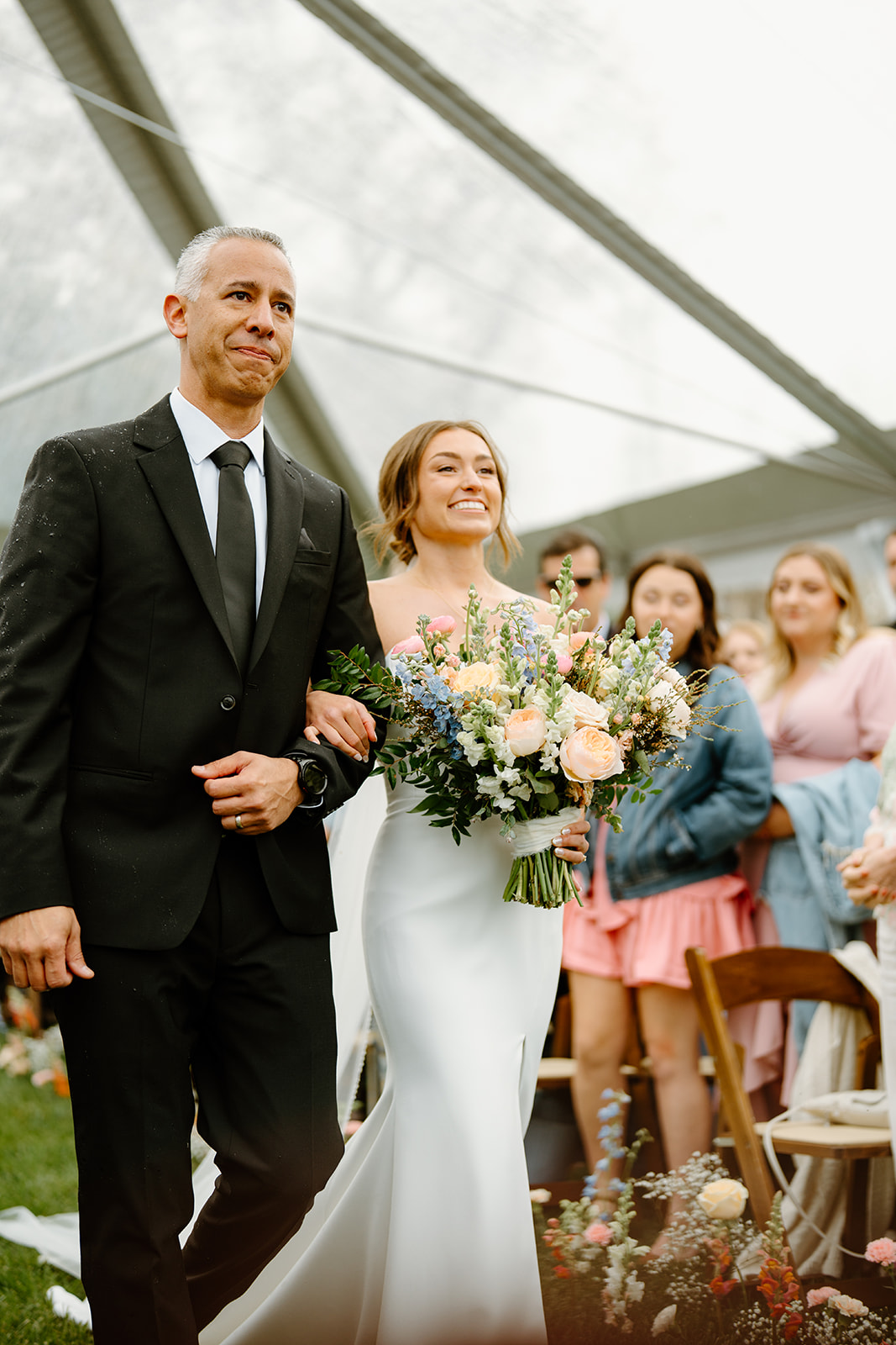 bride walks down isle at wedding in San Luis Obispo CA, photography by Cobblestone