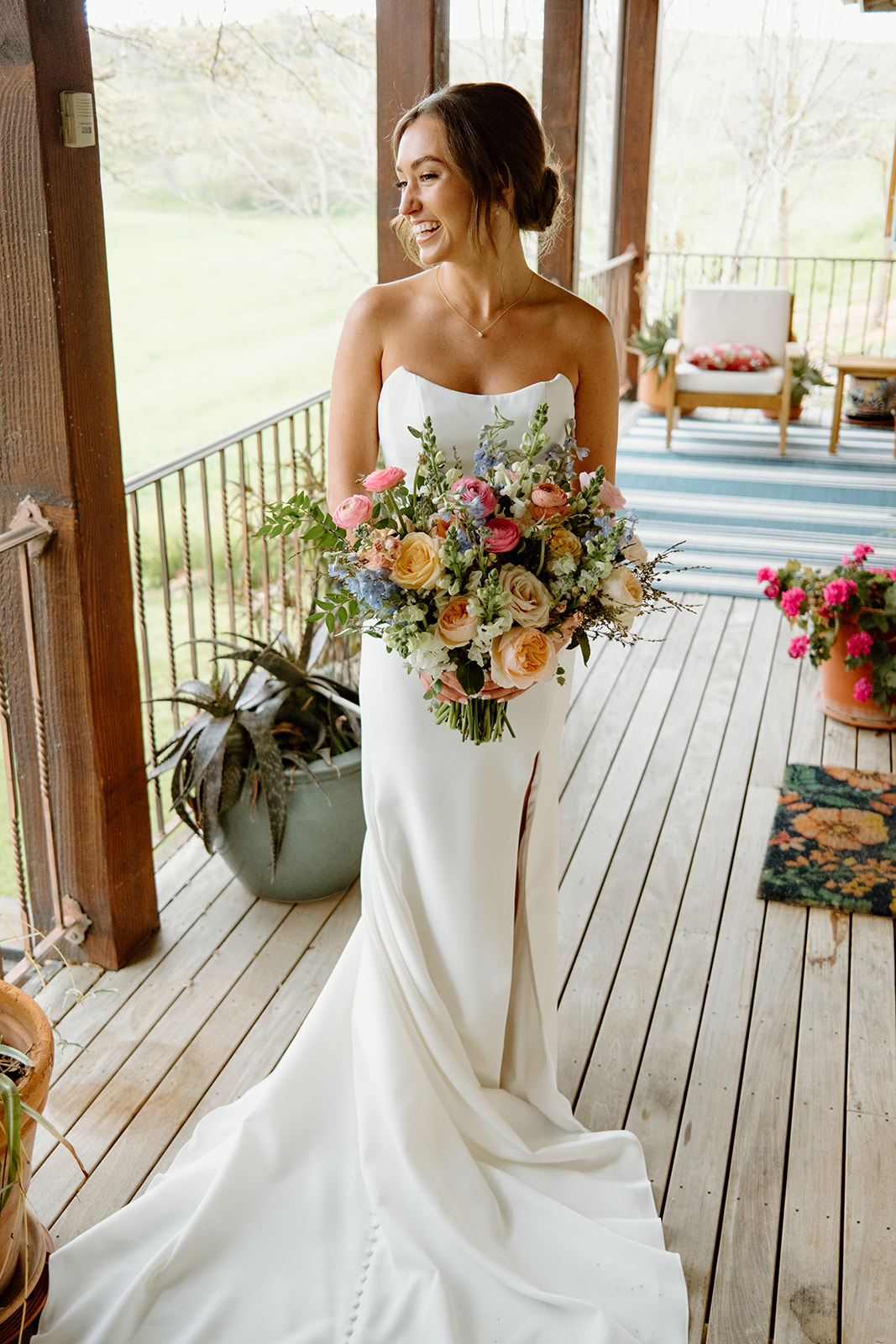 Bride with florals and wedding dress San Luis Obispo CA, photography by Cobblestone