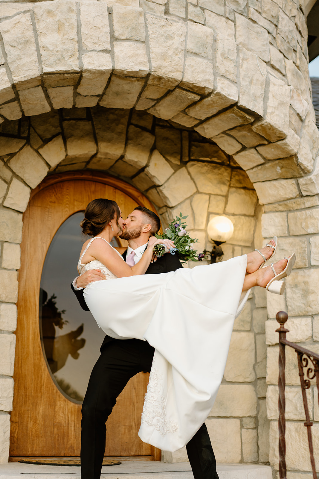 bride and groom walk steps at Chateau Noland in San Luis Obispo CA, photography by Cobblestone