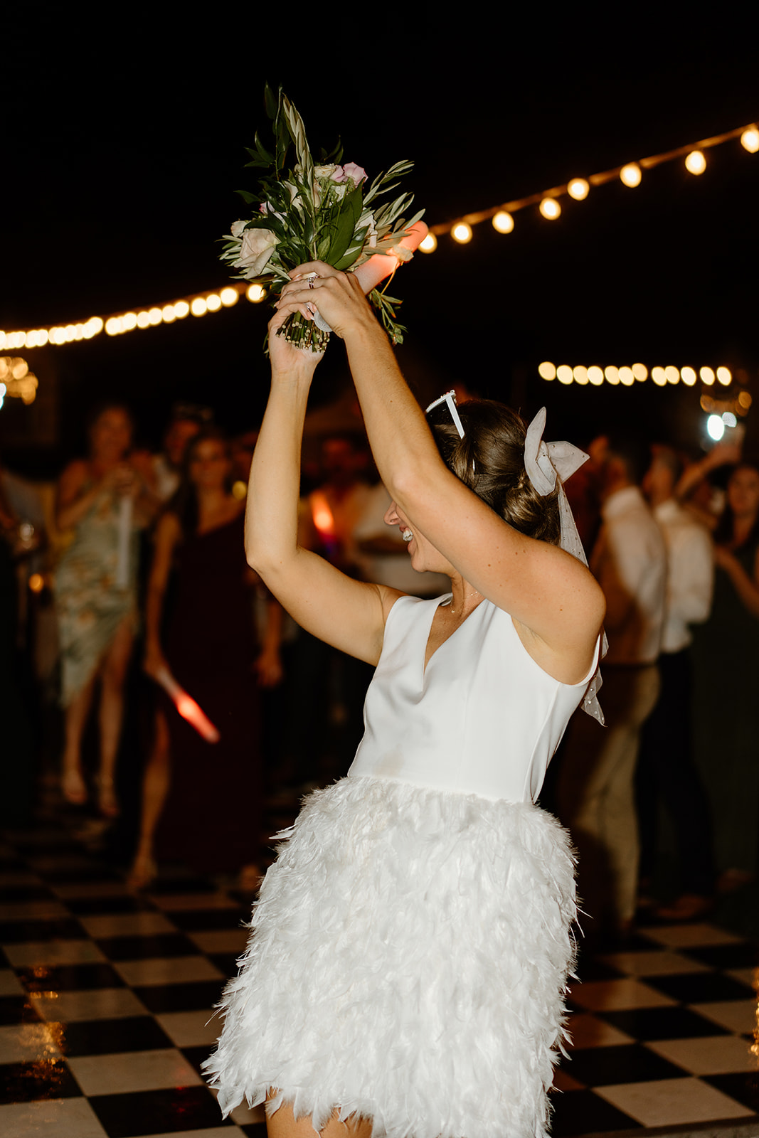 bouquet toss at wedding in San Luis Obispo CA, photography by Cobblestone