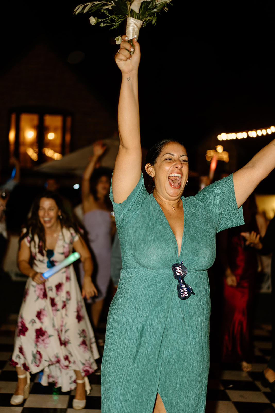 bouquet toss at wedding in San Luis Obispo CA, photography by Cobblestone