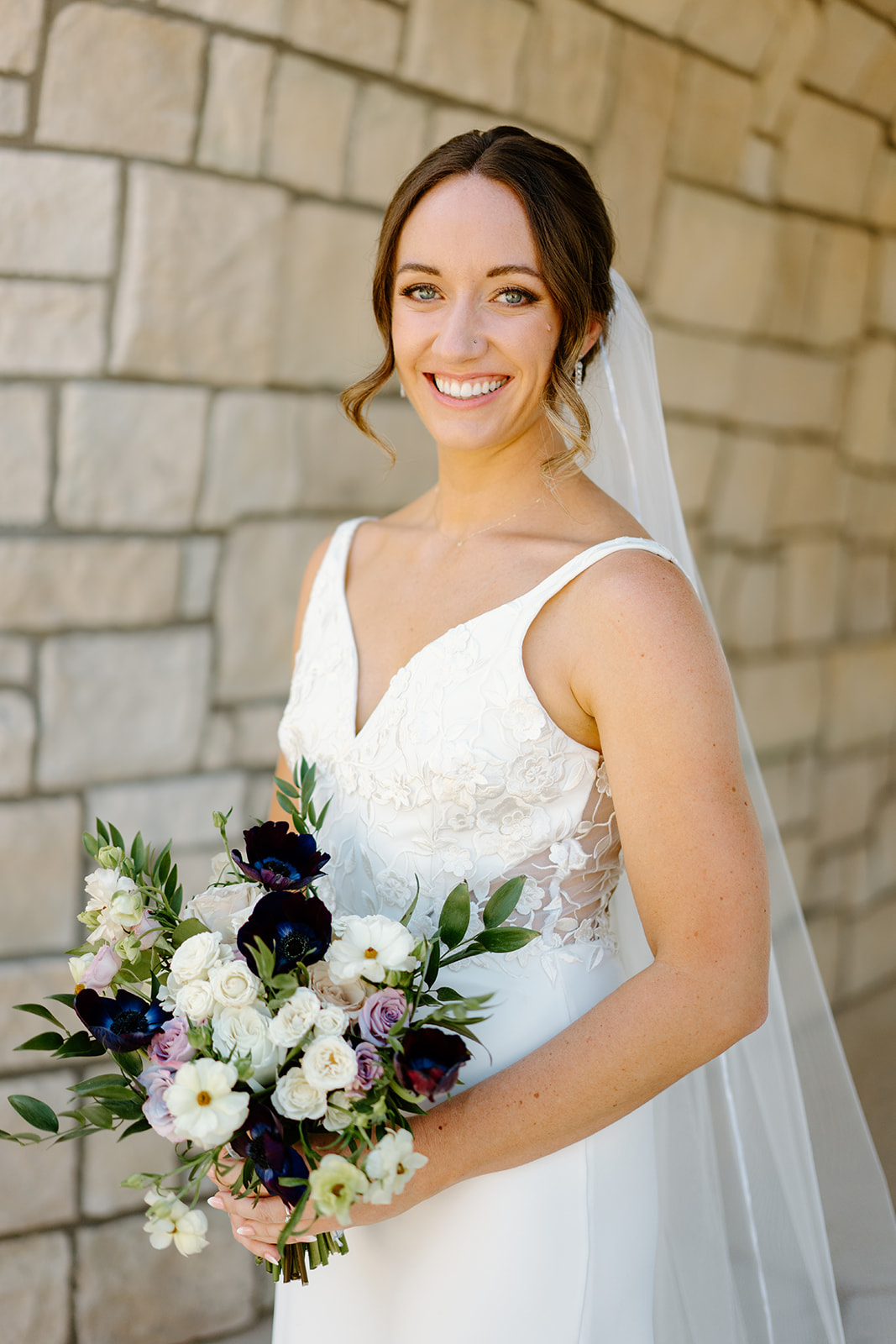 bride with florals at wedding in San Luis Obispo CA, photography by Cobblestone