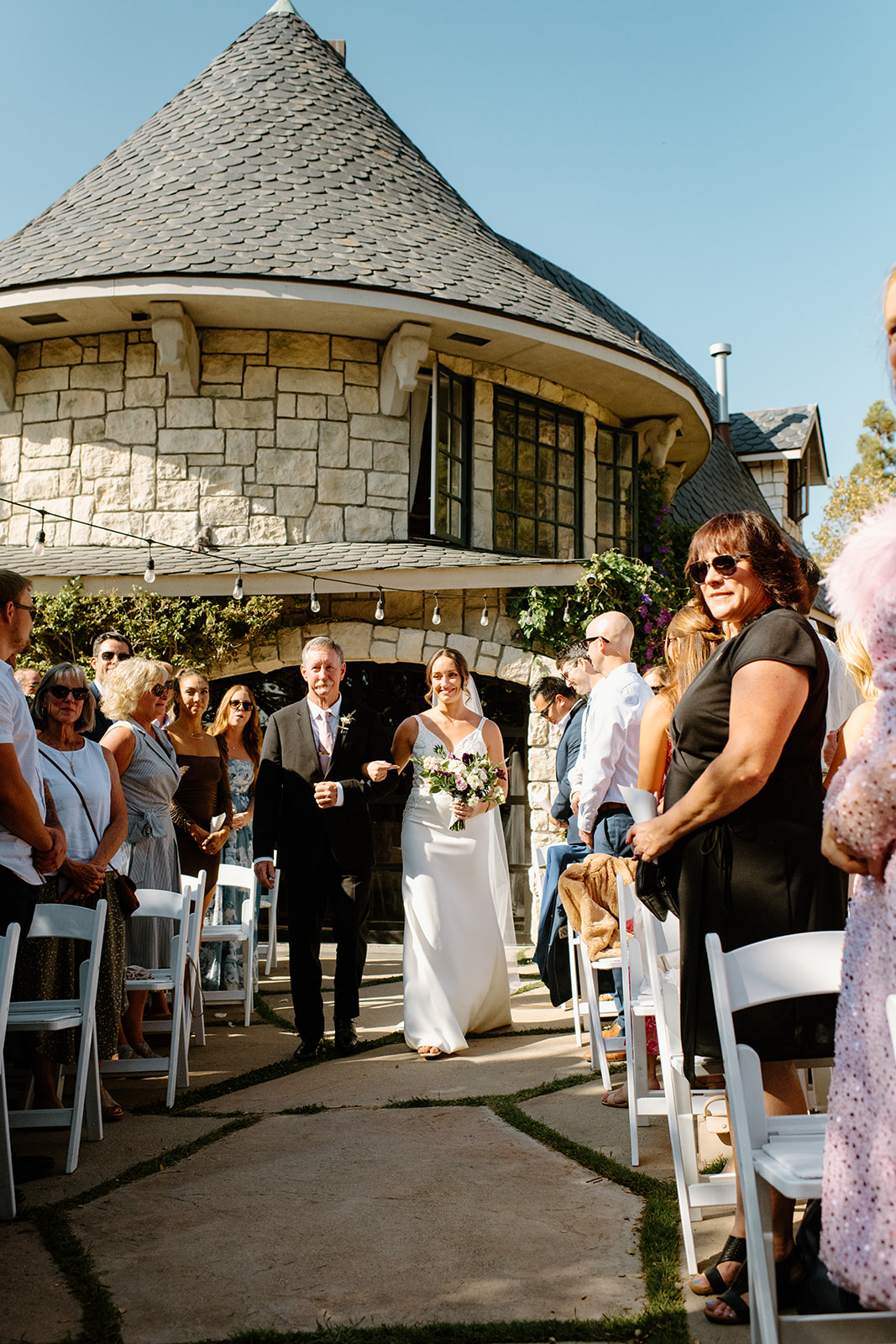 bride walk down isle at wedding in San Luis Obispo CA, photography by Cobblestone