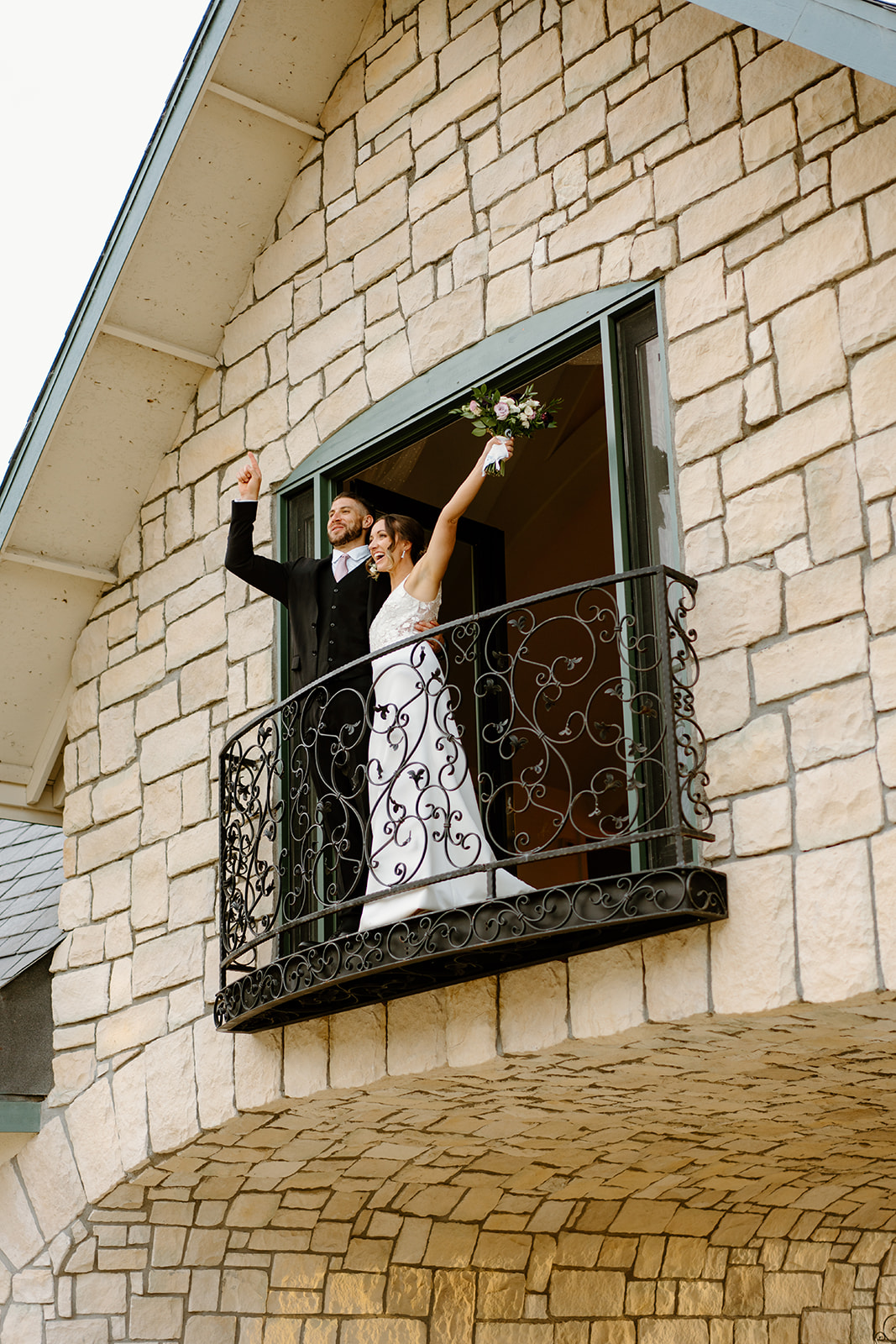 bride and groom on the balcony wedding in San Luis Obispo CA, photography by Cobblestone