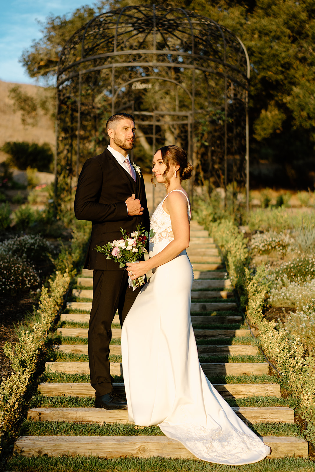 bride and groom pose after wedding in San Luis Obispo CA, photography by Cobblestone